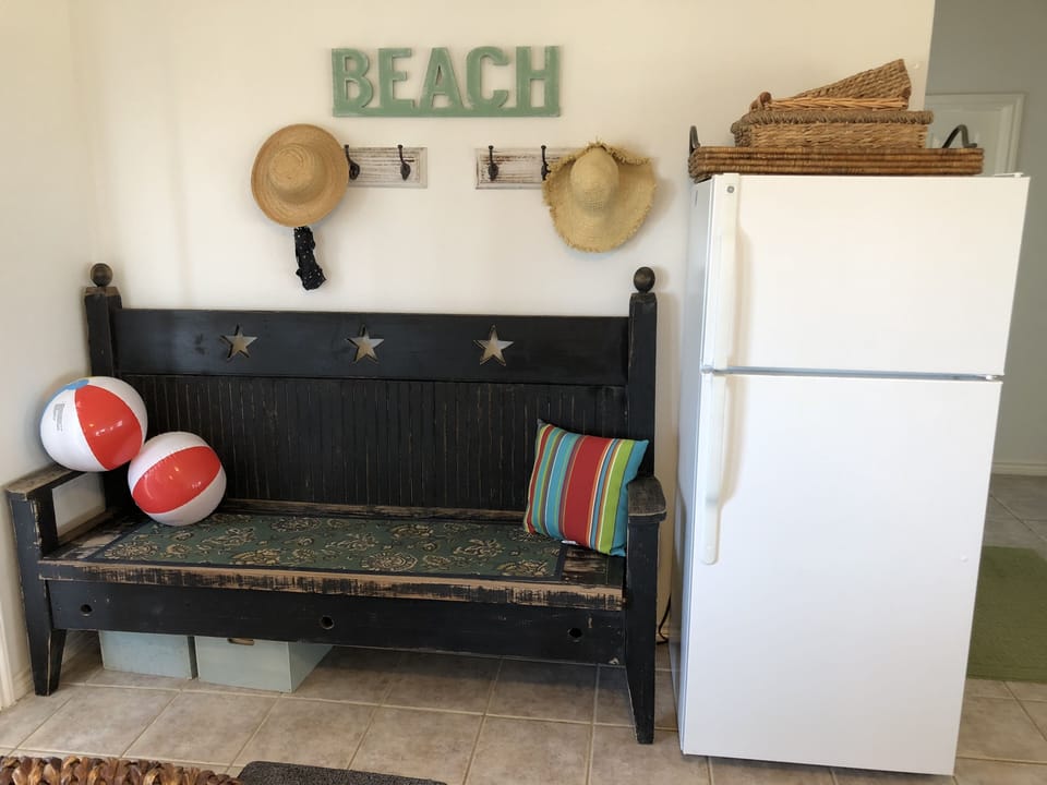 Second refrigerator and additional seating. 