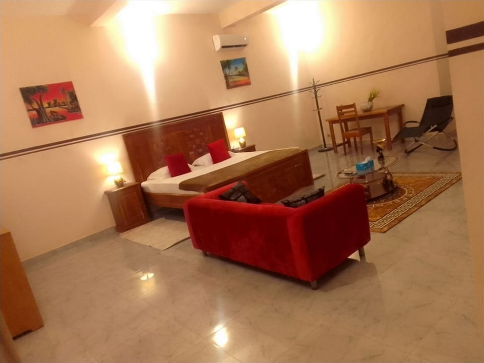 Superior Room, 1 King Bed, Non Smoking, Garden View | Minibar, in-room safe, individually decorated, individually furnished