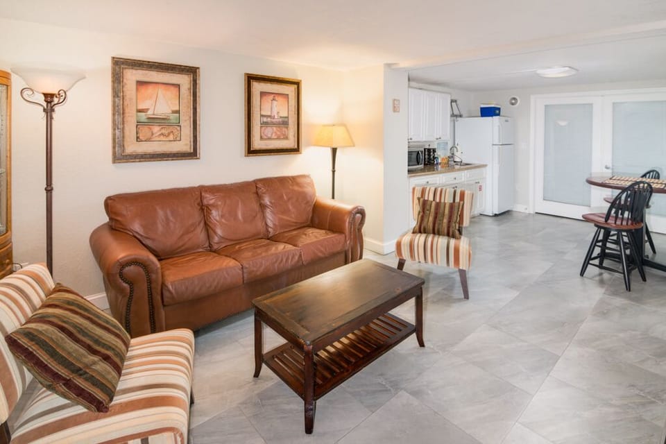 1st floor livingroom or 4th bedroom w/ awesome sofa-bed and 65" smart TV.