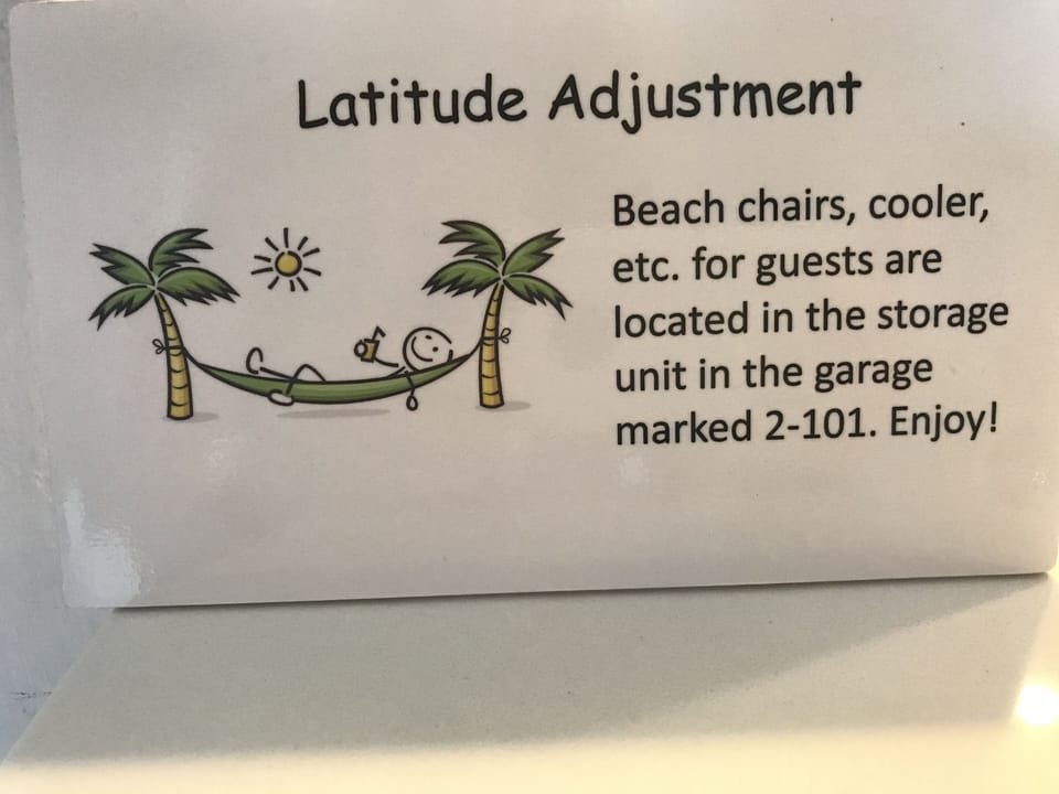 Beach chairs, coolers, sand toys available for guests of Latitude Adjustment