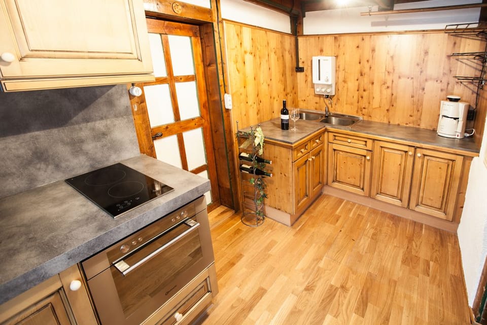 Chalet, 3 Bedrooms (Chalet) | Private kitchen | Full-size fridge, microwave, oven, stovetop