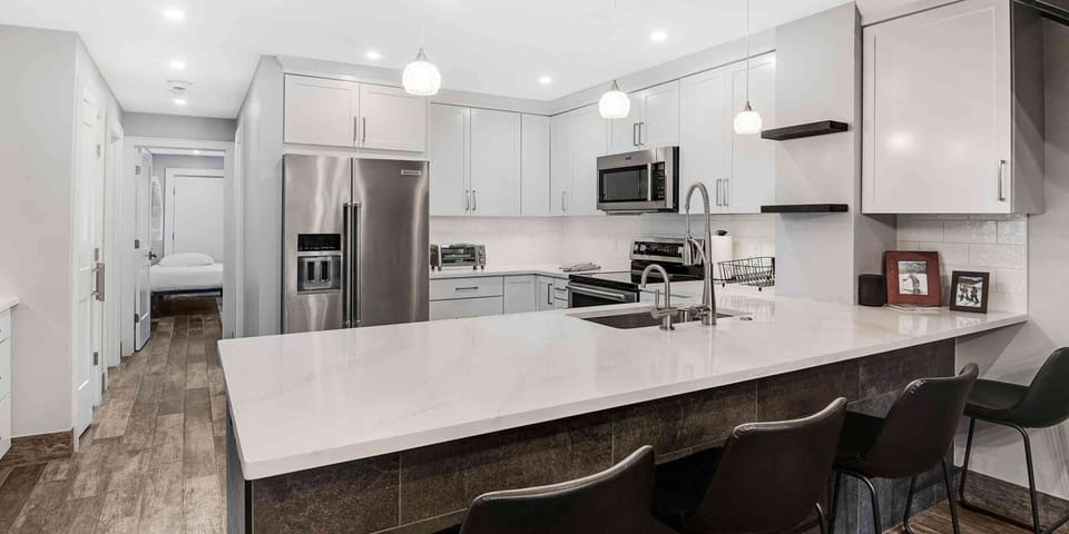 Condo, 4 Bedrooms | Private kitchen | Coffee/tea maker, fridge, oven, toaster