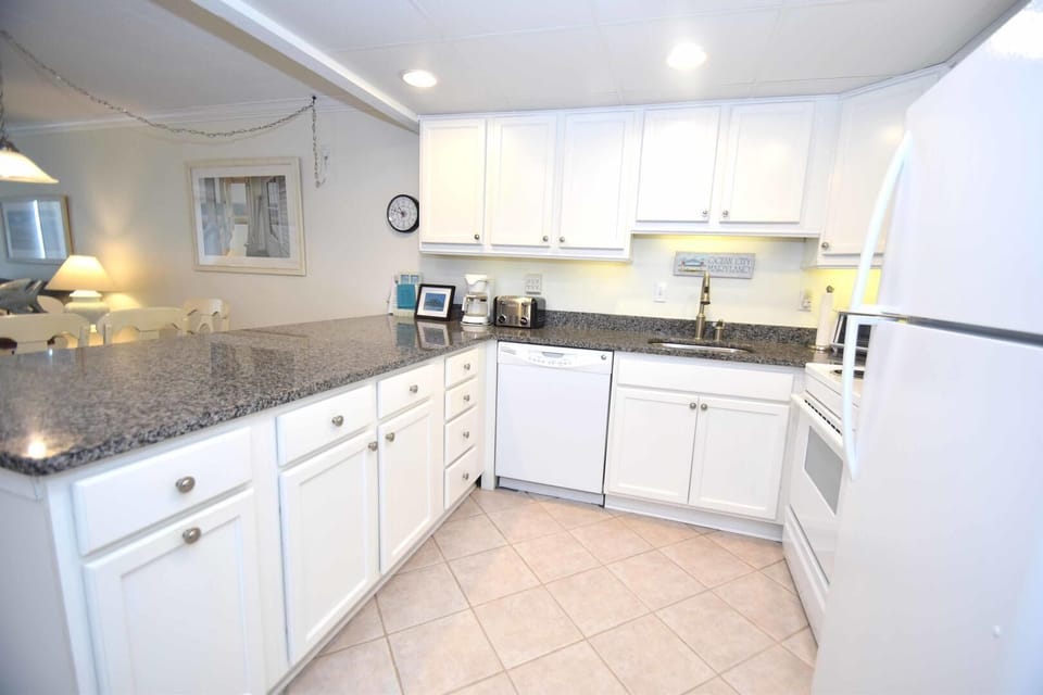 Condo, 2 Bedrooms | Private kitchen | Fridge, microwave, dishwasher, coffee/tea maker