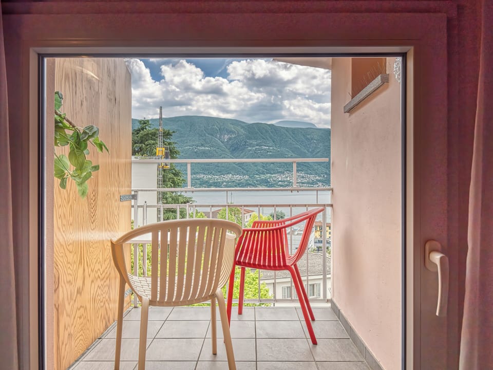 Panoramic Double Room, Balcony, Lake View | Down comforters, in-room safe, desk, blackout drapes