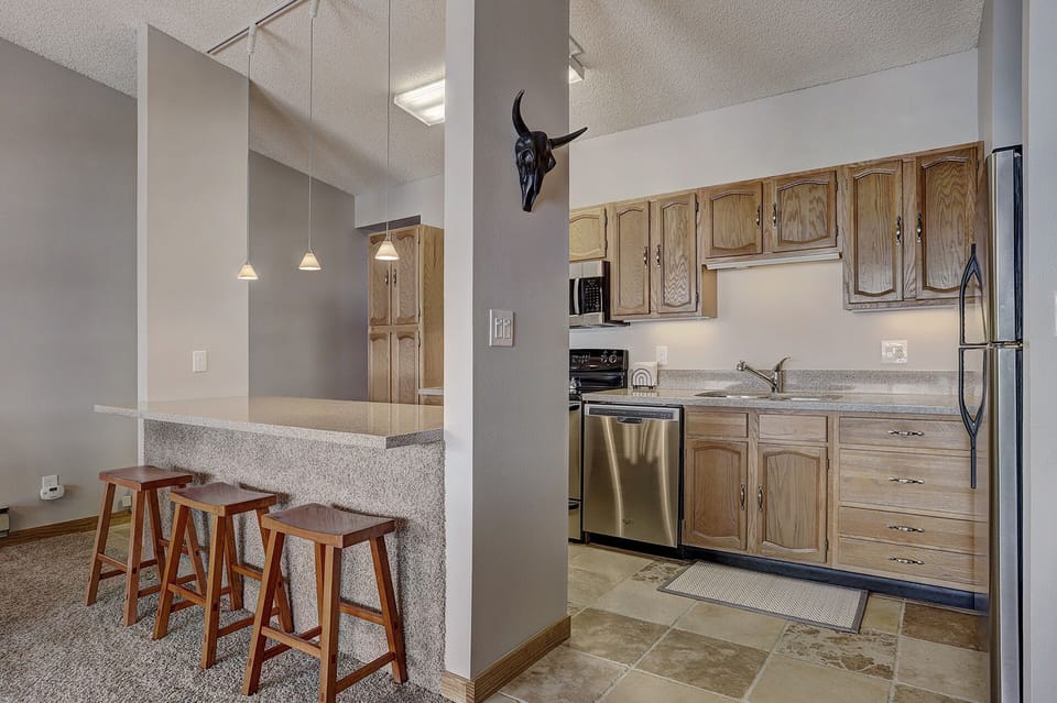 Condo, 2 Bedrooms | Private kitchen | Fridge, microwave, oven, dishwasher