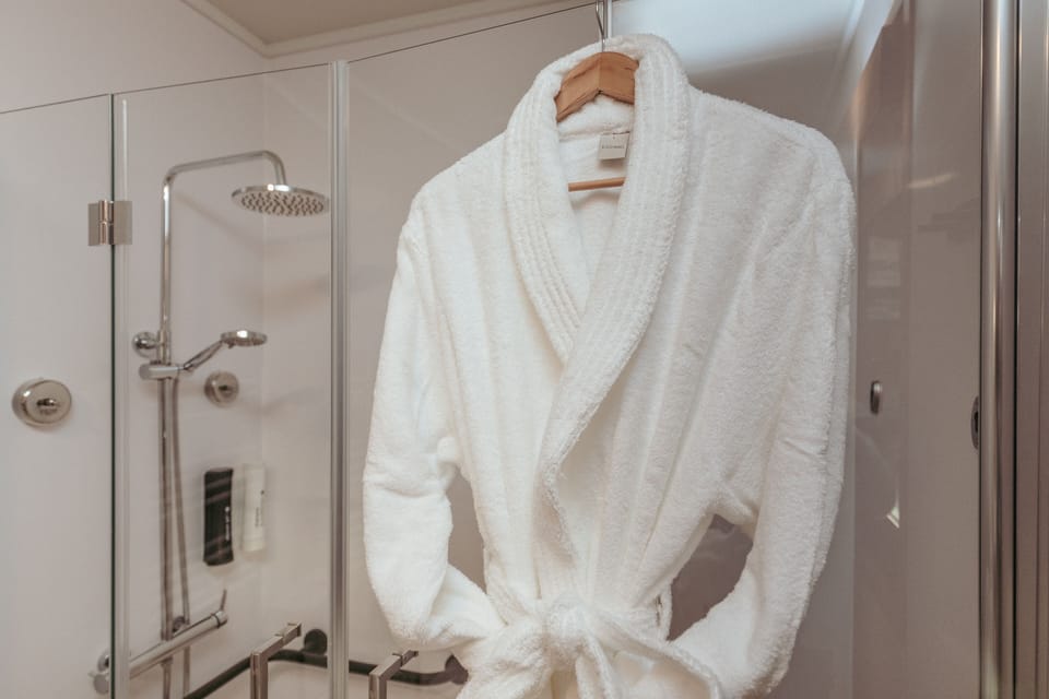 Shower, eco-friendly toiletries, hair dryer, towels