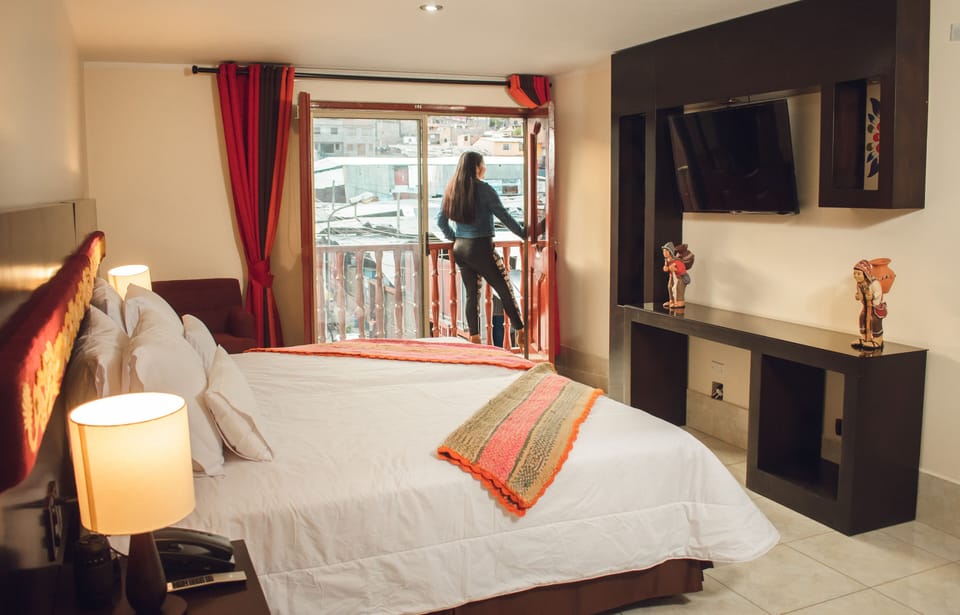 Deluxe Double Room | Desk, laptop workspace, blackout drapes, free WiFi