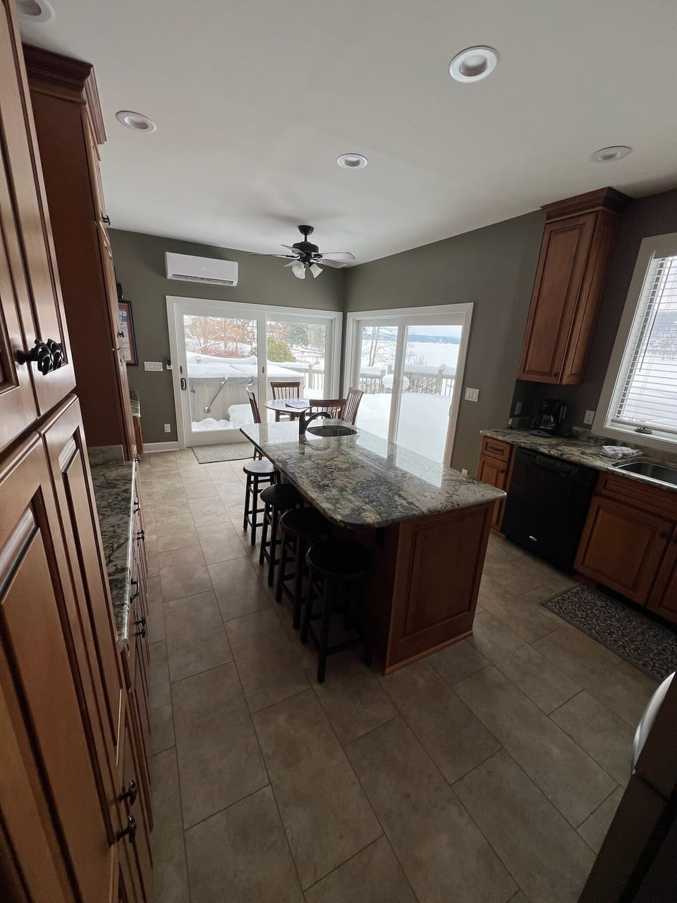 Kitchen view with hot tub access through sliding door