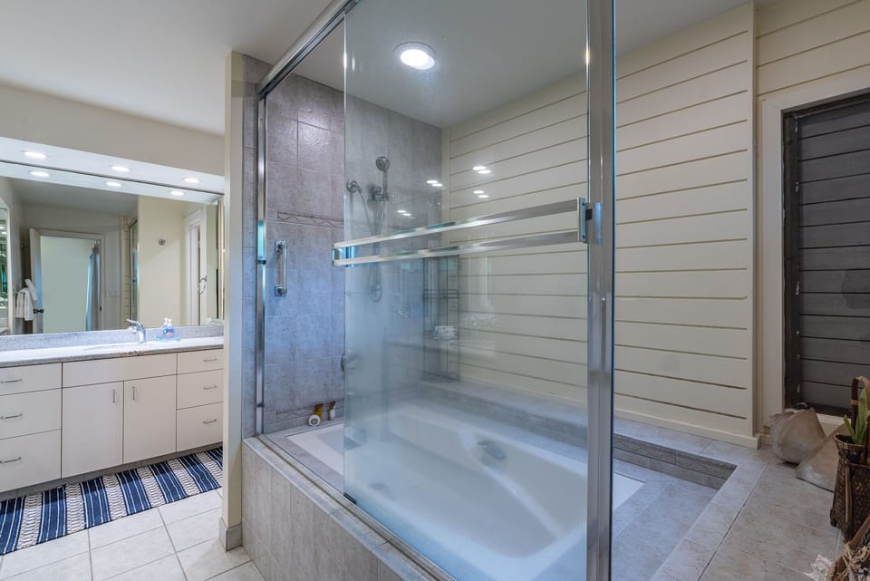 Whether you prefer a quick, refreshing shower or a leisurely soak, this bathroom caters to all your needs.
