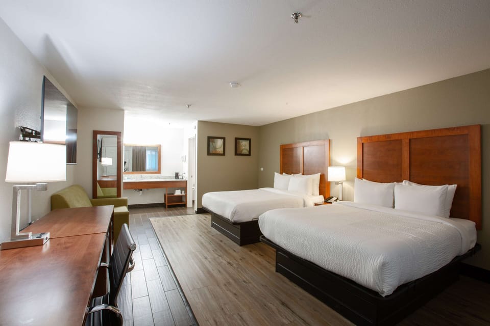 Family Room, 2 Queen Beds, Non Smoking (with Sofabed) | 1 bedroom, individually furnished, desk, iron/ironing board