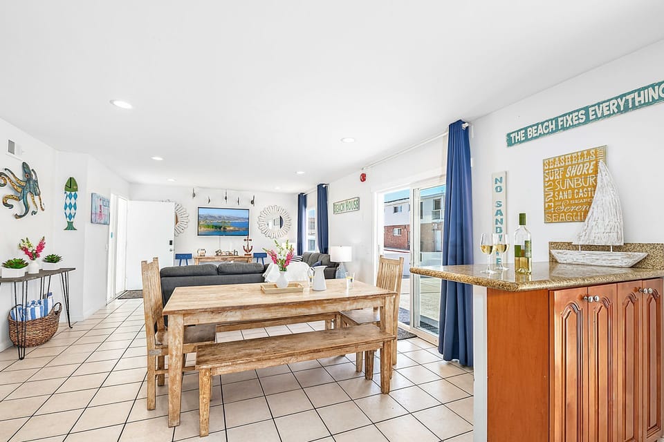 Dining and kitchen area with easy indoor-outdoor flow
                