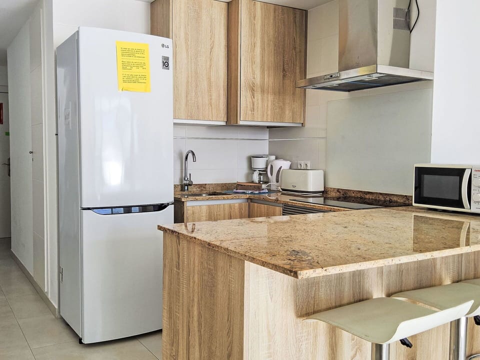 Flooring, Floor, Furniture, Interior Design, Wood, Room, Kitchen, Major Appliance, Cabinetry, Countertop