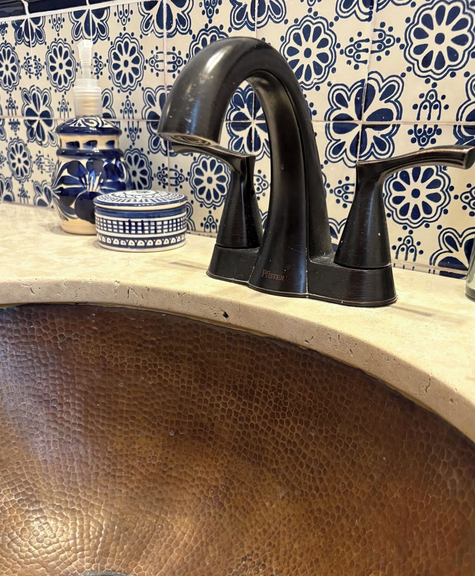 Hand painted Mexican tile in traditional design