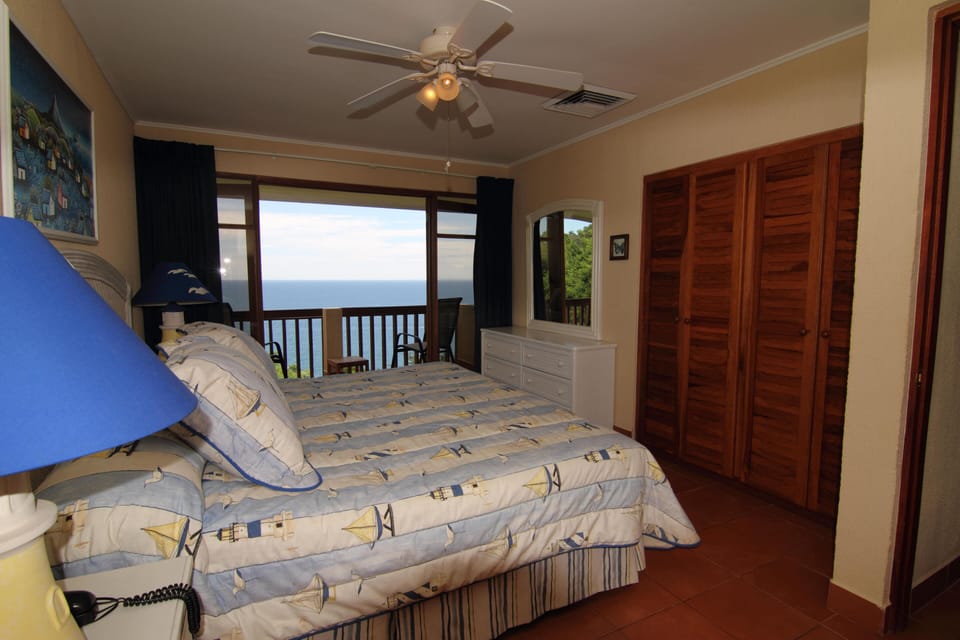 Master bedroom with balcony and private full bath. Incredible ocean view. 