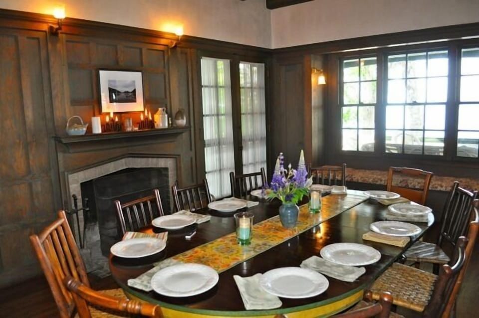 Dining room with wood burning fireplace