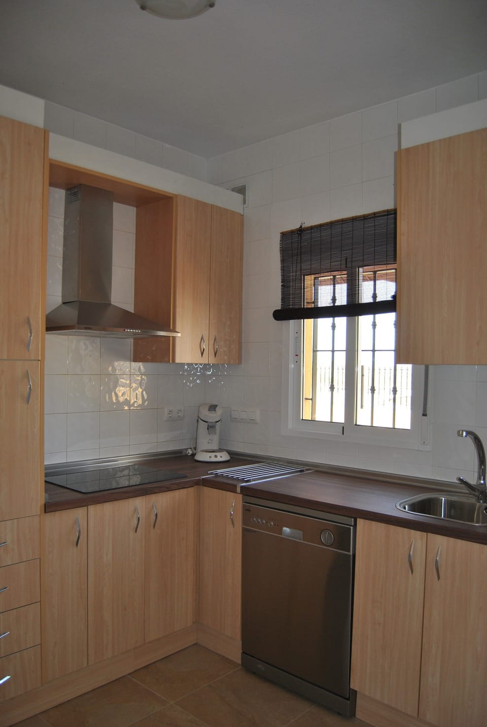 Modern fully equipped kitchen with dishwasher and all utensils you need.