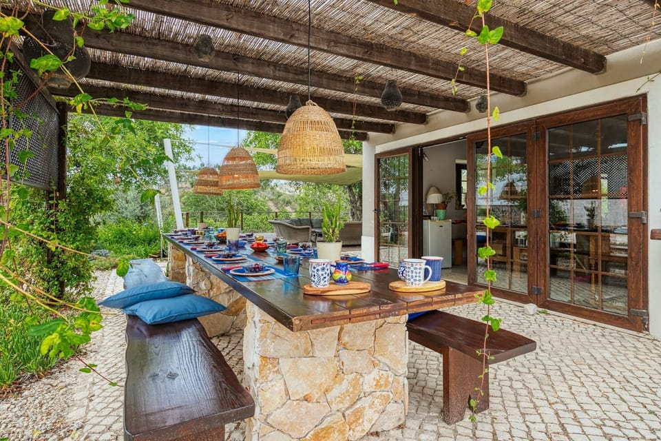 eating area leading from the kitchen; ideal for breakfast, seating 16 guests.
