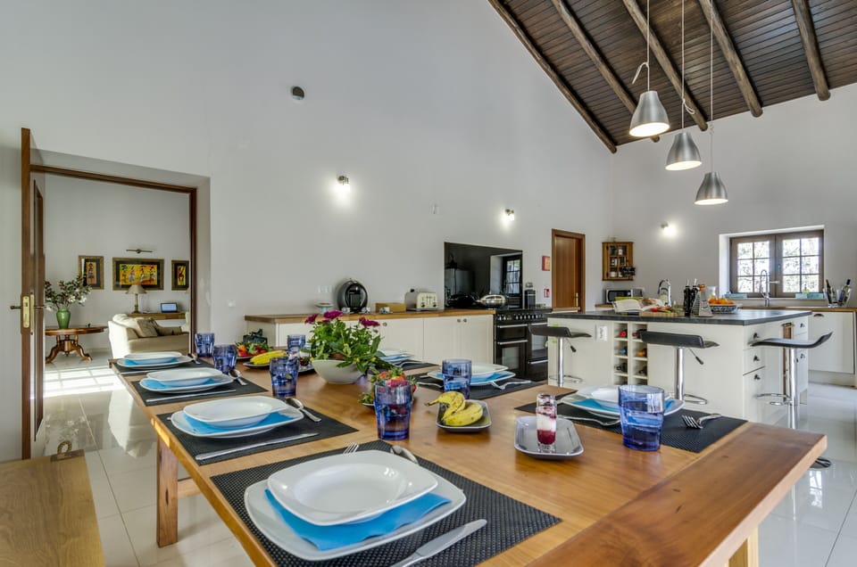 Farmhouse kitchen with 10-seater cherrywood table