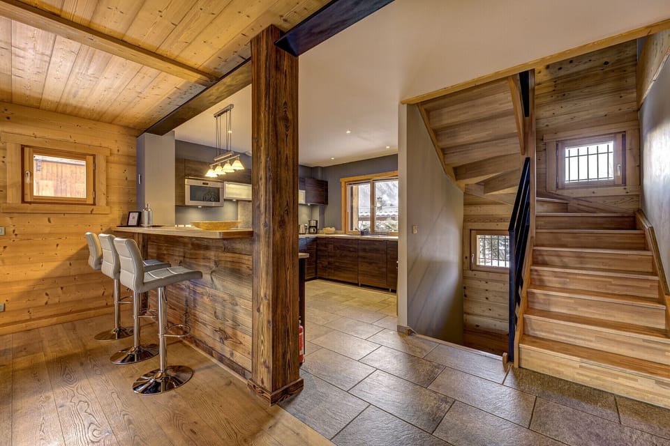Stairs lead to the 3 bedrooms on the 1st floor