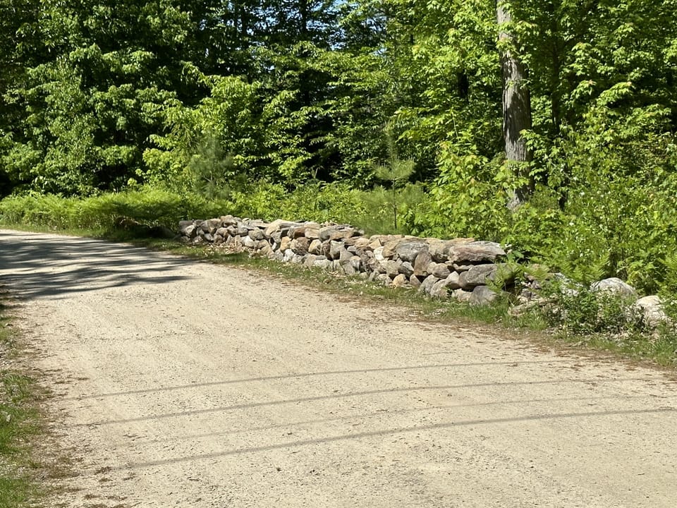 Stone walls private road to association and it’s 5 homes