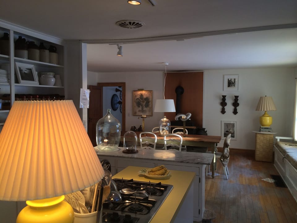 Ample kitchen with center island opens to dining area