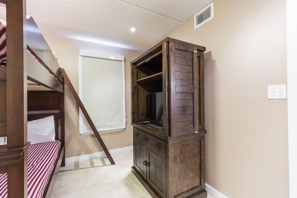 Another look at the bunk bedroom designed with comfort and convenience in mind.