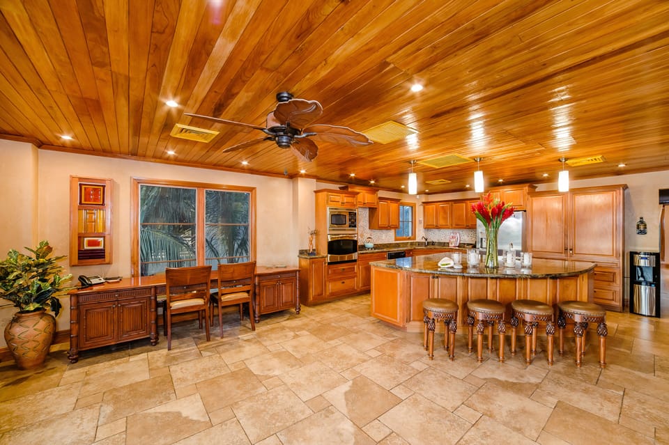 Kitchen area with big desk 