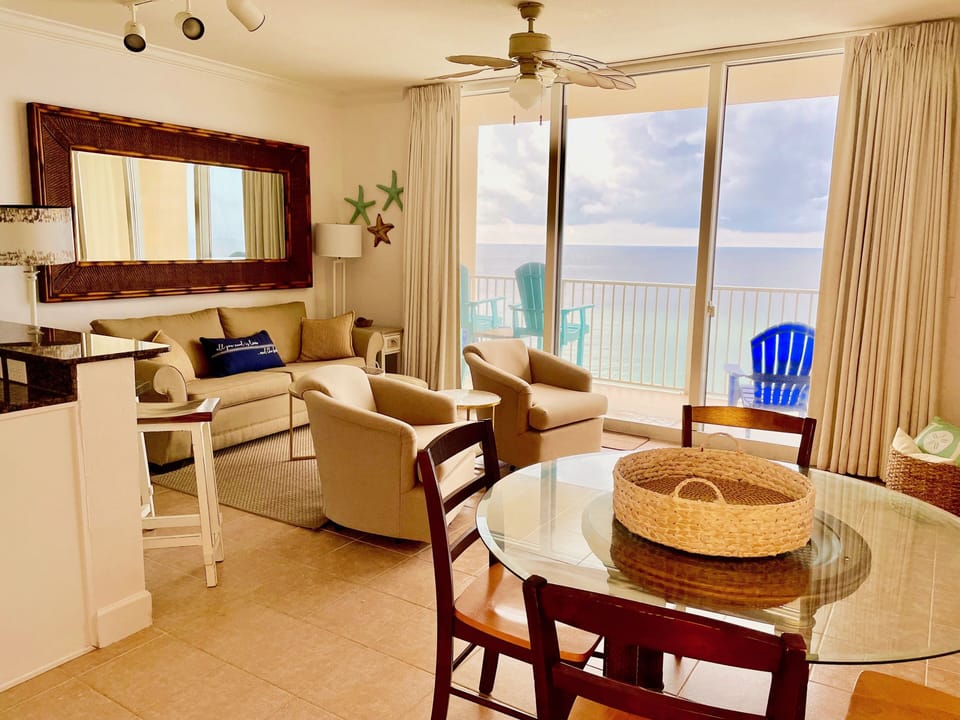 OCEANFRONT! Living Room features sleeper sofa and smart TV.