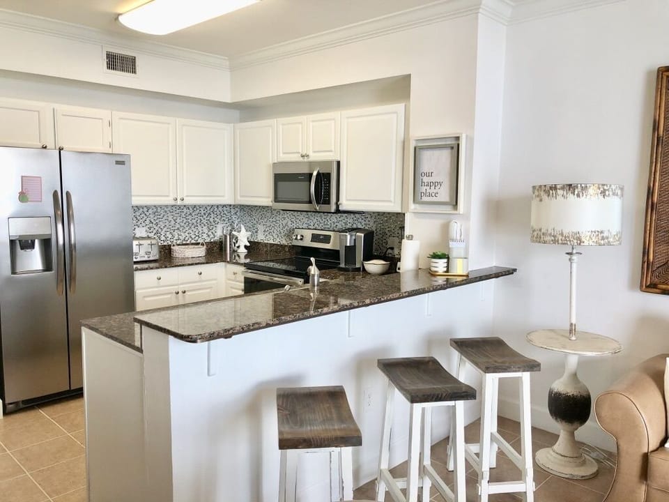 Fully stocked, pots, pans, cooking & eating utensils kitchen overlooking ocean!