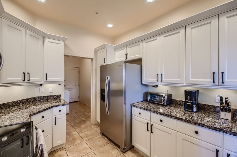 Bright & updated kitchen with all stainless steel appliances. 