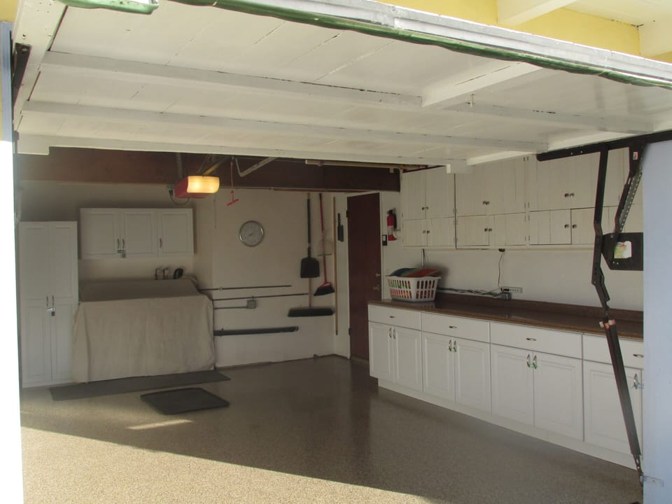 Single car garage with parking for 1 additional car on driveway pad
