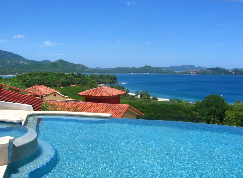 Our shared infinity pool with a breathtaking view of Flamingo Bay and coastline