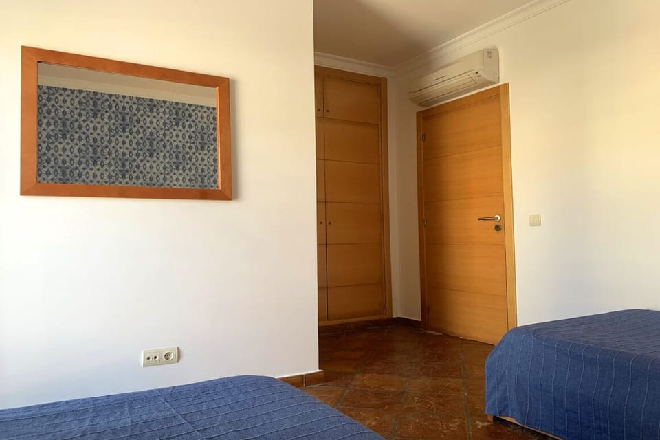 Bedroom 2: ensuite shower, fitted wardrobe and door to the upstairs corridor