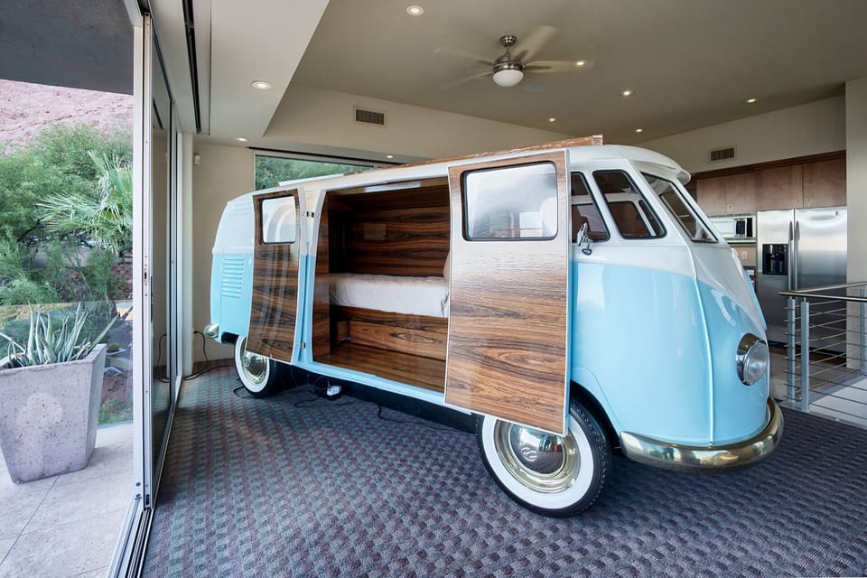 Custom VW Bus converted into a twin bed w/ mini fridge inside in casita