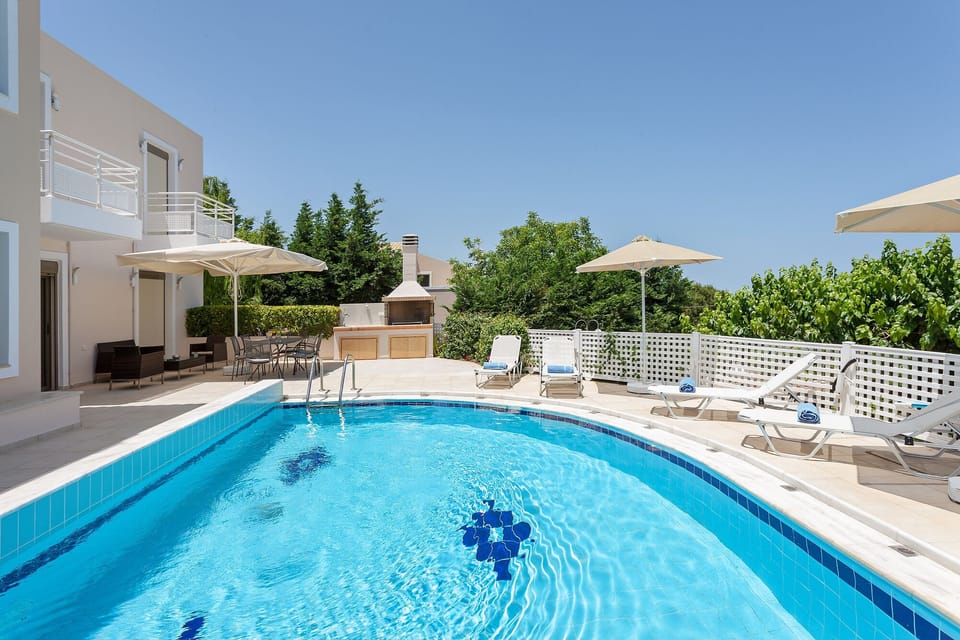 Patio with swimming pool and BBQ