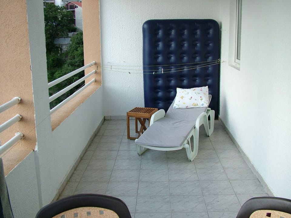 Sunbeds on terrace
