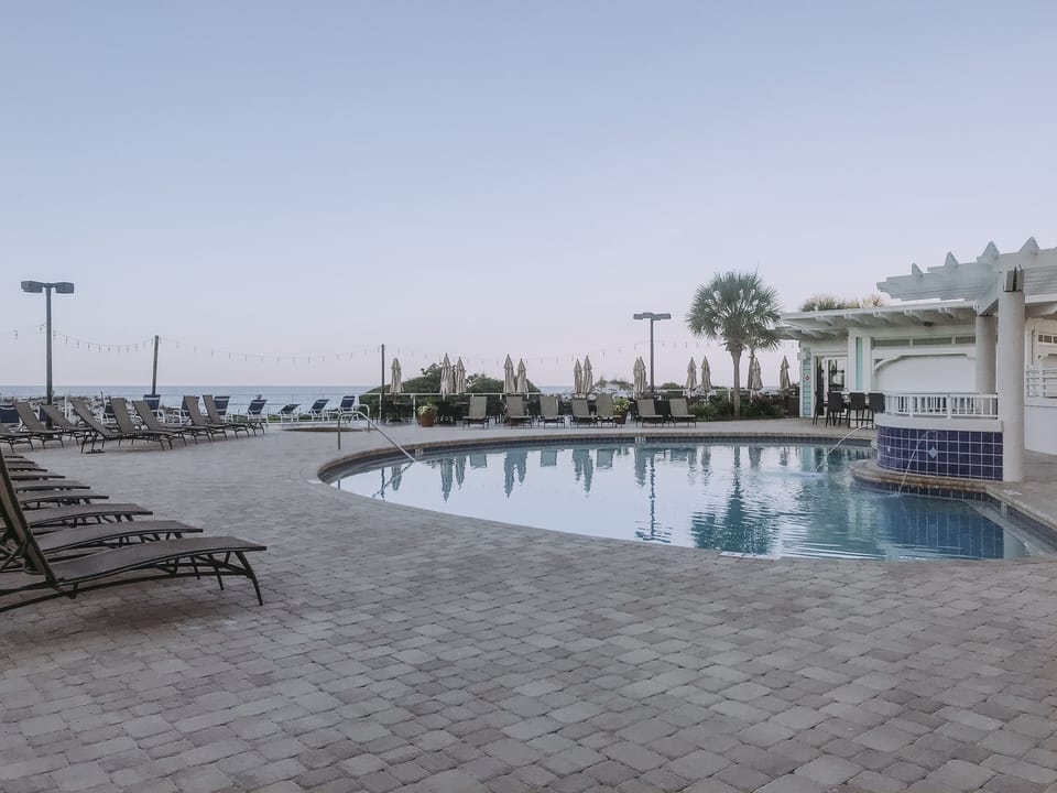 The Main Pool - dine poolside at Blue Dunes Grille or grab a Tiki Bar drink!