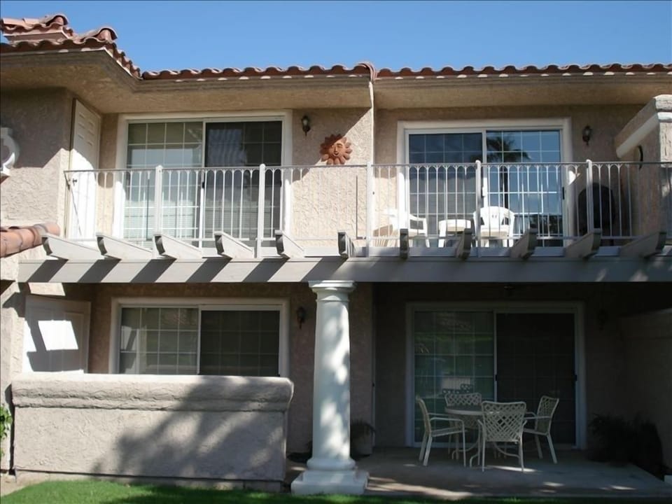 Your balcony and doors to living room and master bedroom, as seen from the pool.