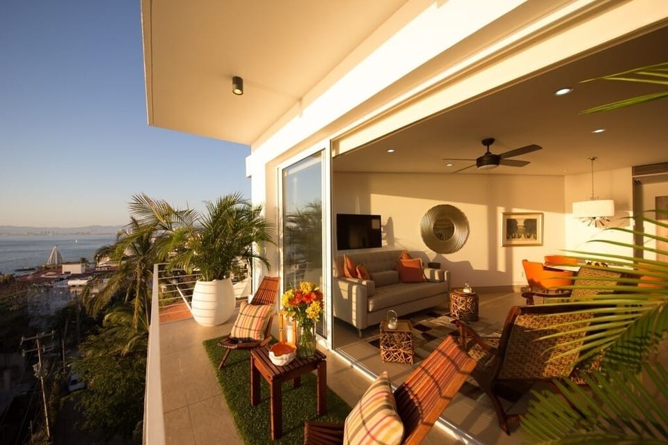 Balcony & living space with un obstruct view of the Pacific Ocean.