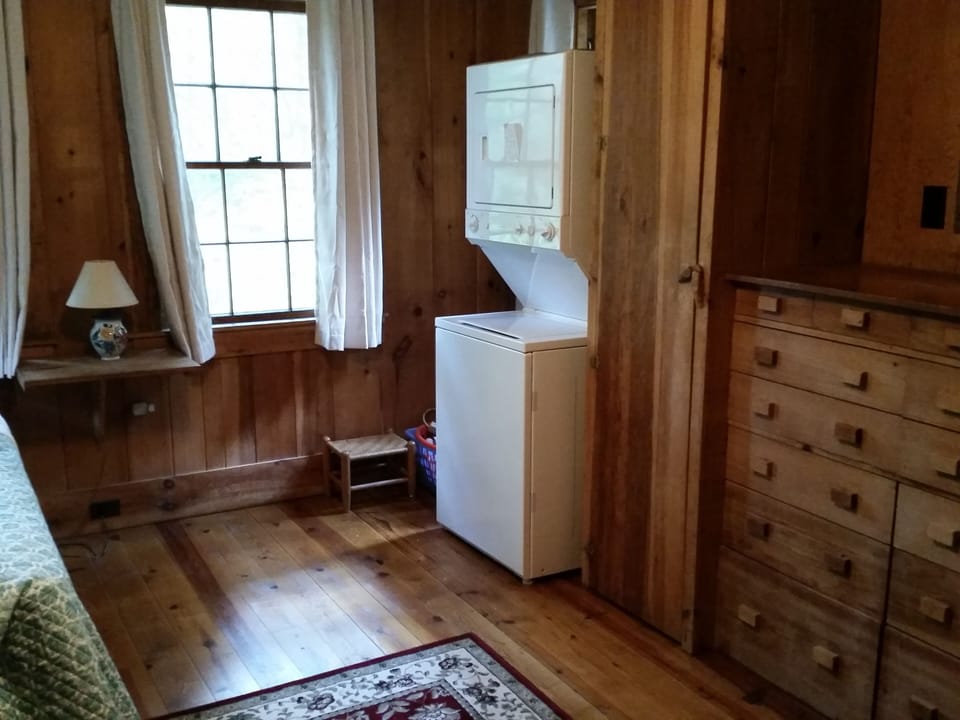Master bedroom showing washer/dryer