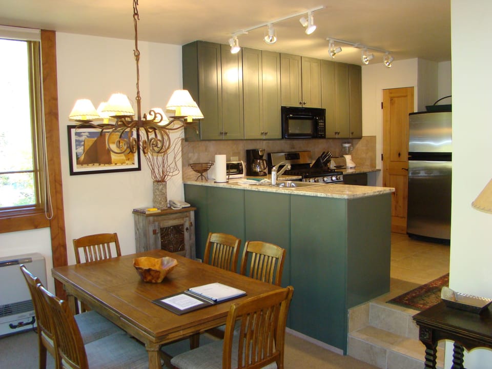 Gorgeous dining/kitchen-fully equipped with granite and stainless appliances.