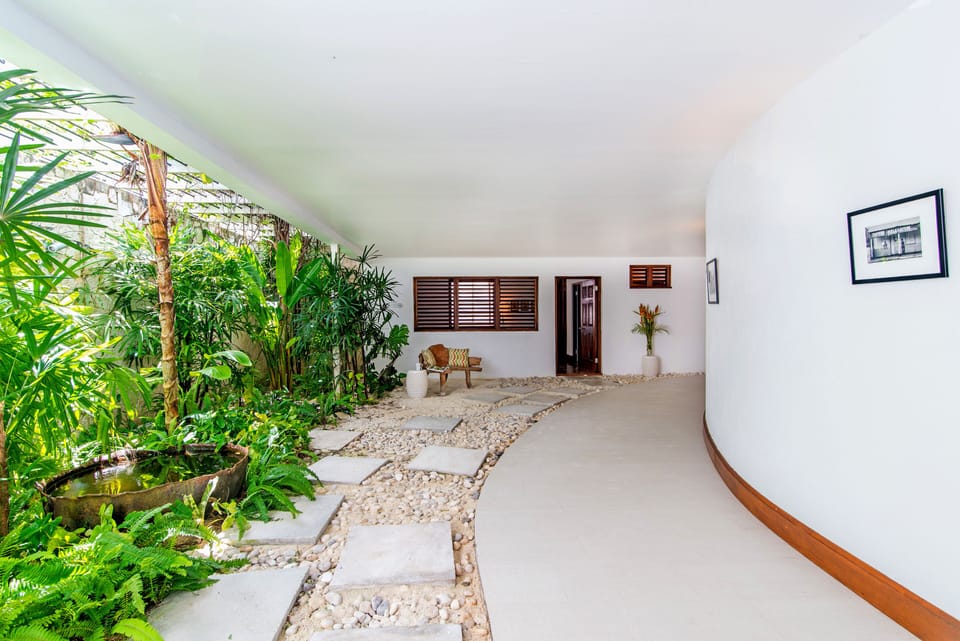 Interior hallway with garden atrium links to all bedrooms and great room