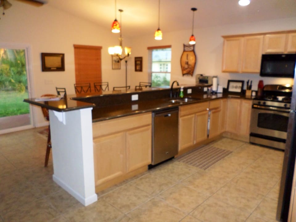 Nice open kitchen with seating high top 