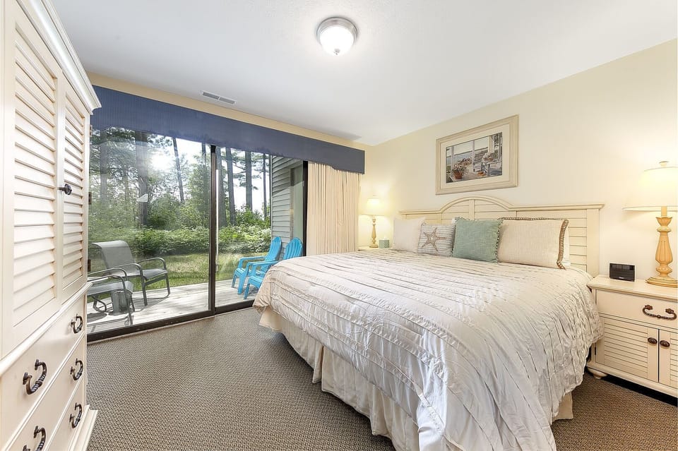Two Suites. Two patios. One peaceful escape. 
King bed in primary room is the beautifully well lit, bright and has it's own patio!