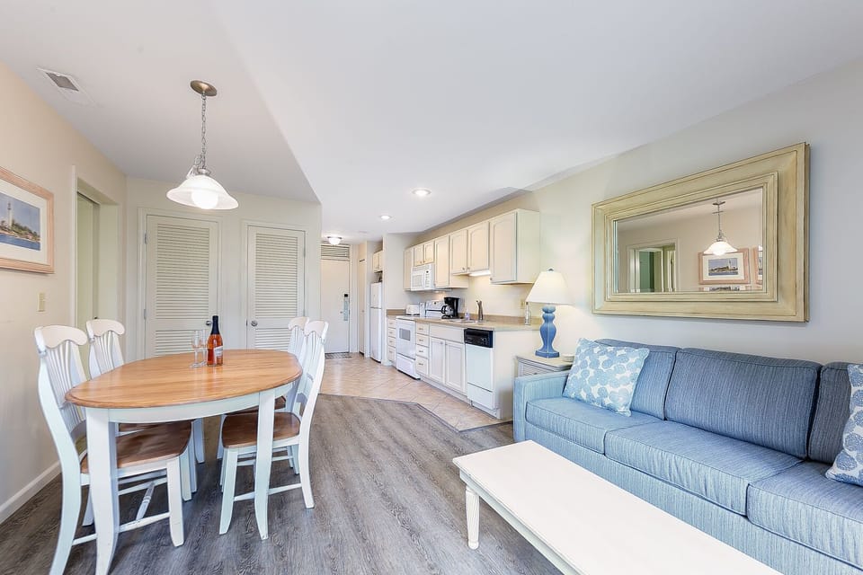 Enjoy sandy beach vibes and the lake breeze while you cook in the full kitchen.