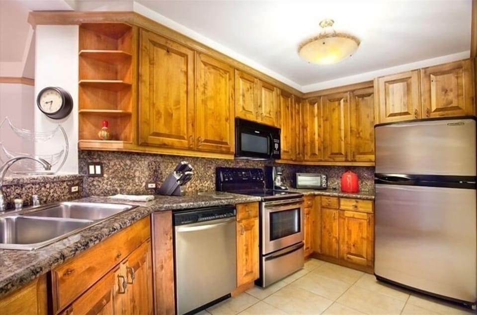 State of the art kitchen with large pass through to dining room and den. 
