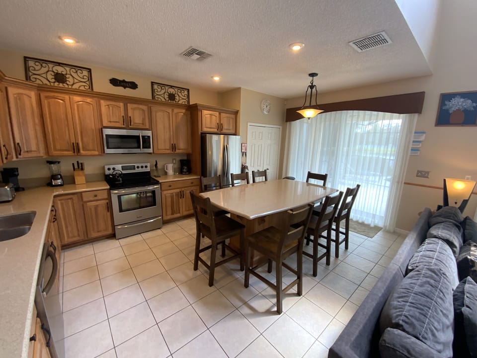 The full fitted kitchen with large island is really the heart of this home. 