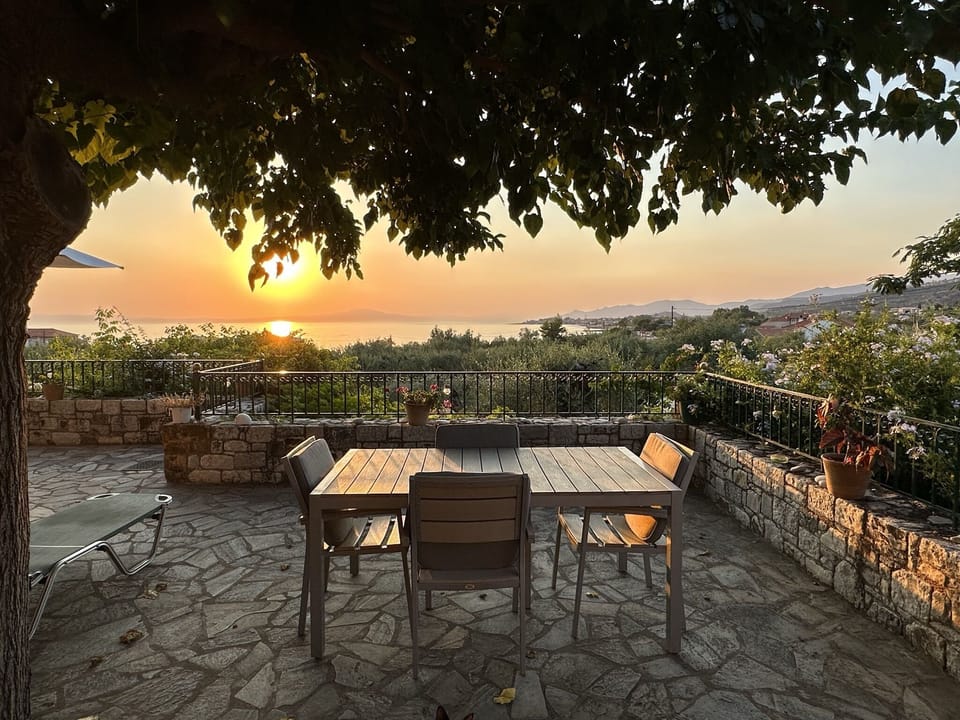 Beautiful sunset from the balcony at  Villa Pefnos.