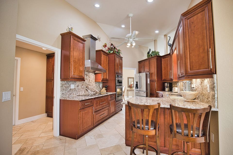 Kitchen with access to Laundry Room and Garage
