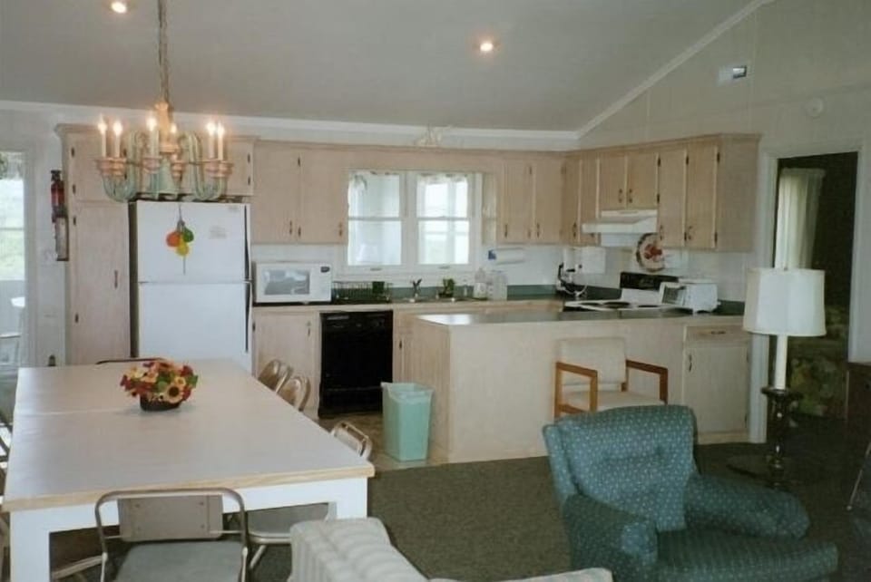 Fully stocked Kitchen connected to the main living area.